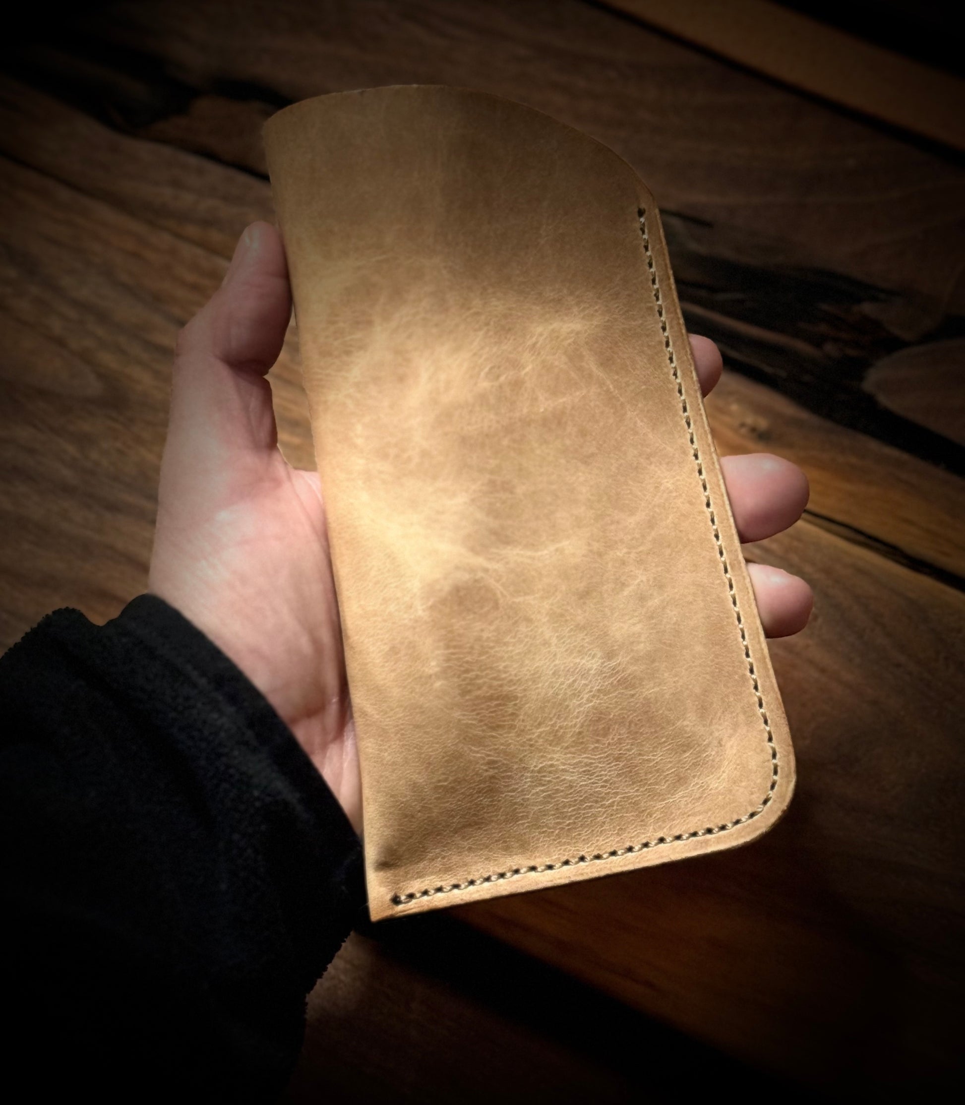Handmade Leather Eye Glasses Case Wheat held in Palm with stitching