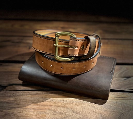 The Palomino - Elegant Gun Belt 1.5" Stacked on leather notebook cover