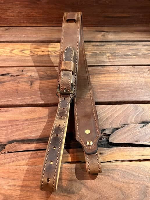 Latigo Classic Rifle Sling overlapping laying on table
